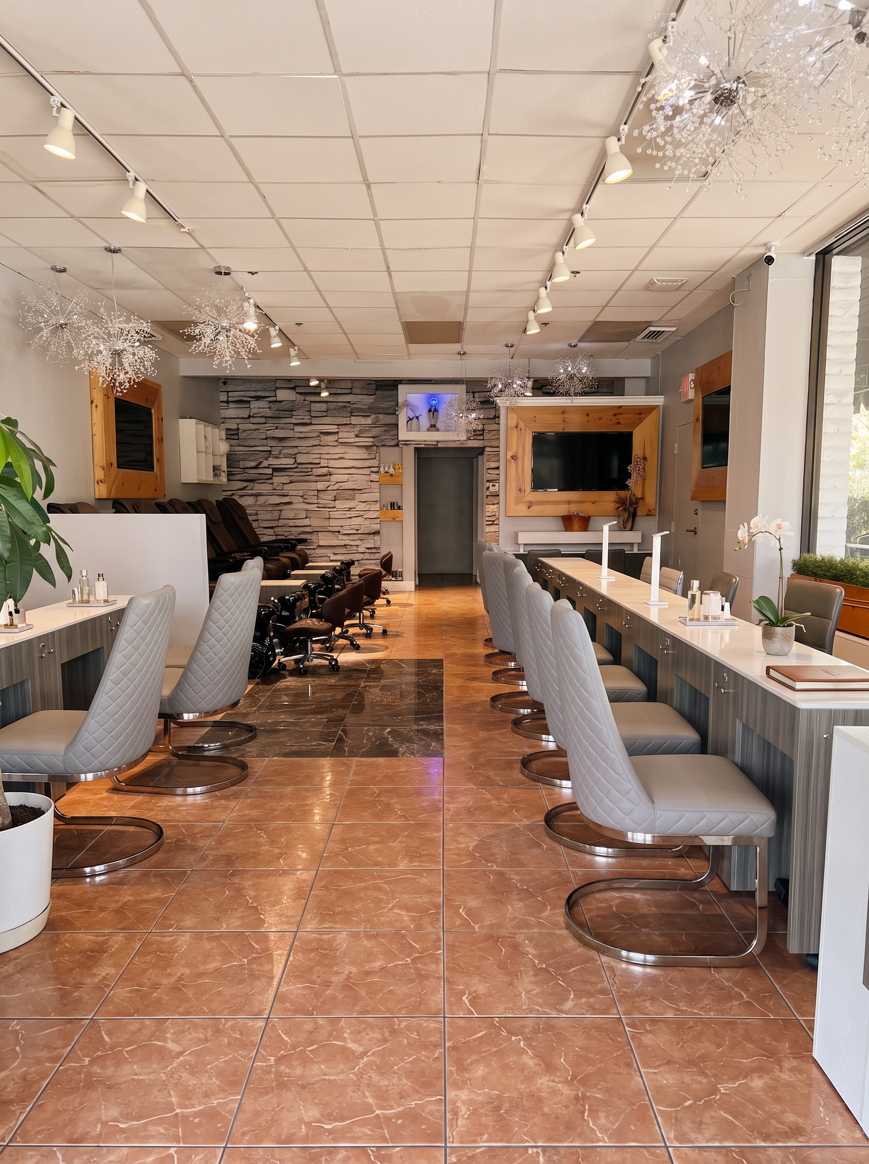 Garden Square Nails & Spa salon floor with manicure stations and crystal chandeliers